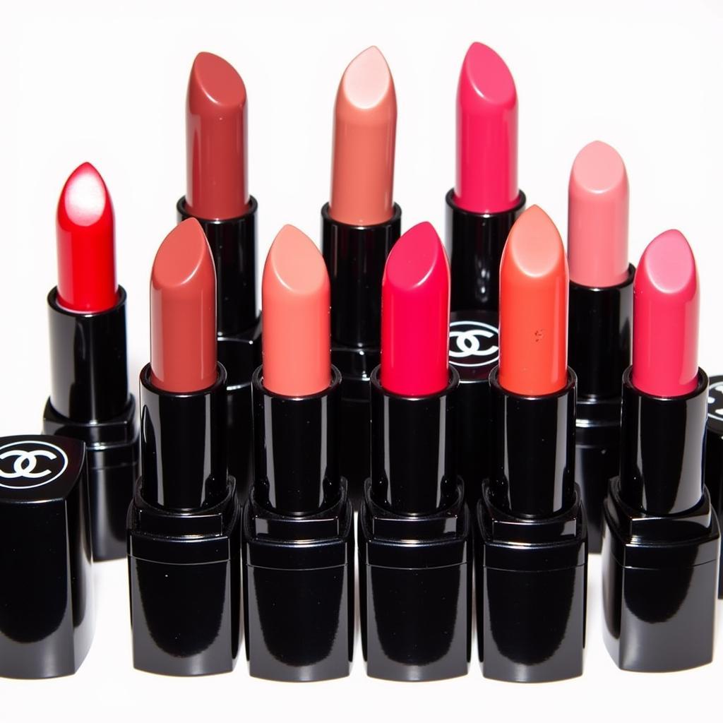 Chanel lipstick shades in red, nude, and pink