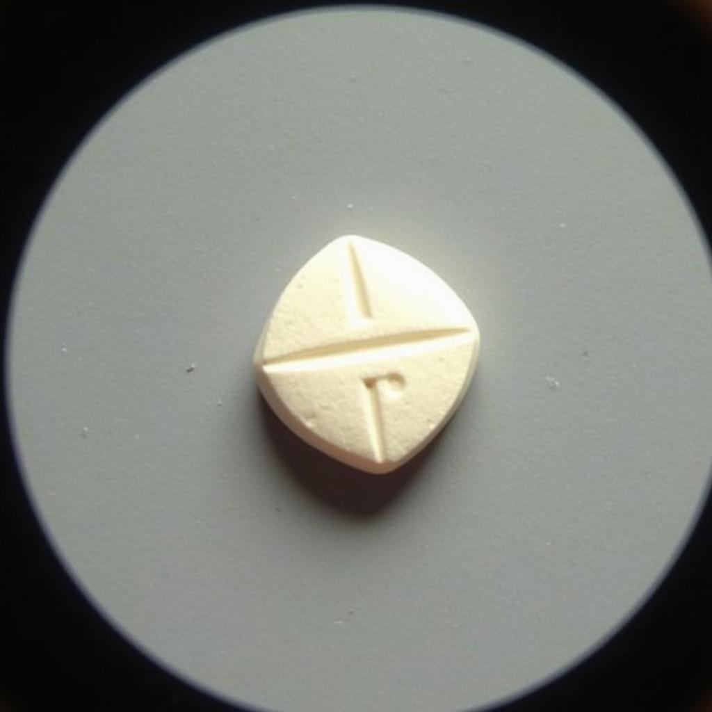 Close-up of a Caflam 50mg Tablet