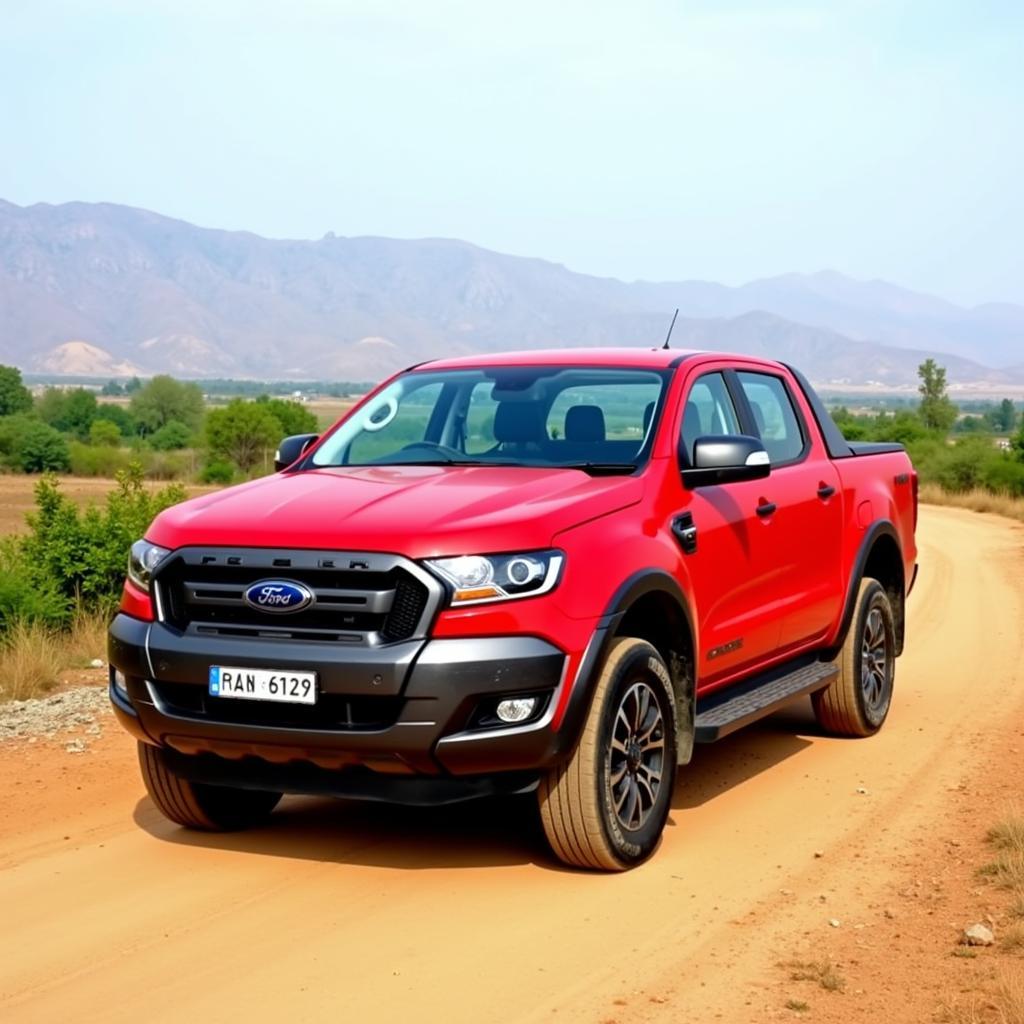 Ford Ranger for Sale in Pakistan - A Red Ford Ranger pickup truck parked on a dusty road in a rural area of Pakistan