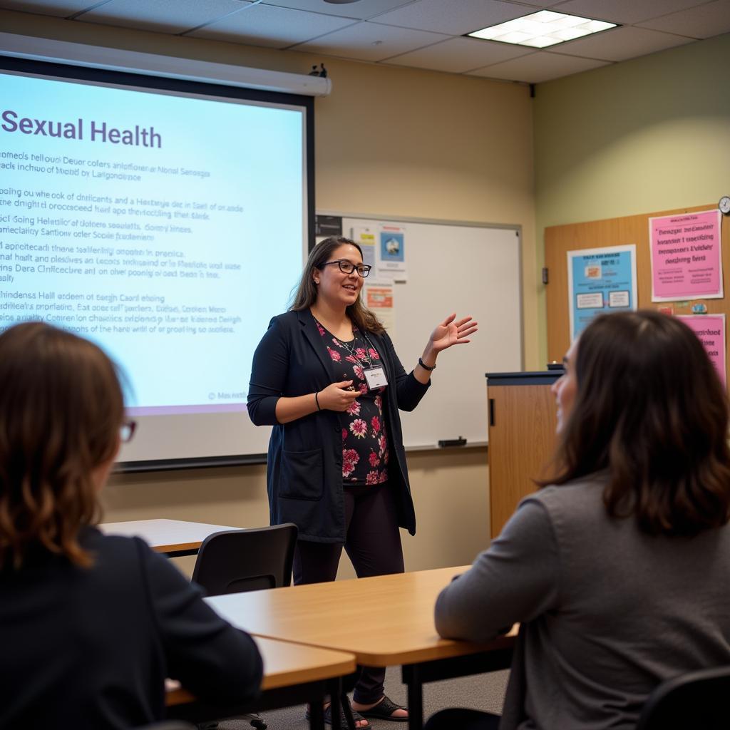 A healthcare professional conducting a sexual health workshop for college students in Pakistan.