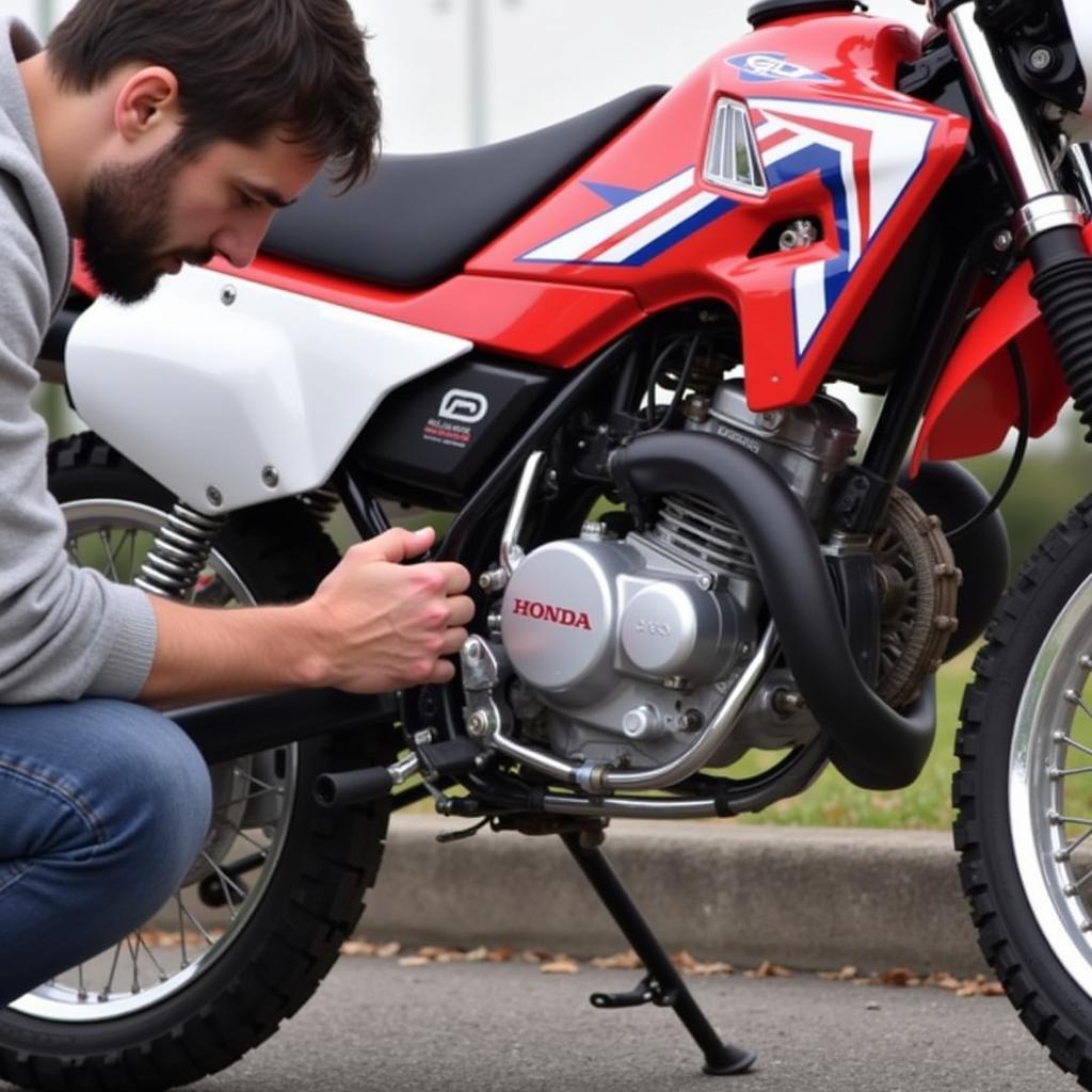 Inspecting the condition of a Honda CD 70 2012 model